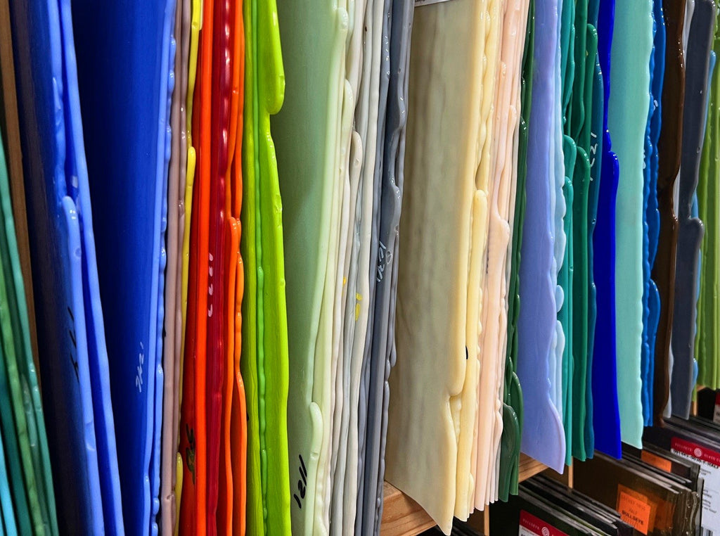 Glass classes in stained glass and fused glass at the Creative Arts Center of Dallas - image of sheets of stained glass